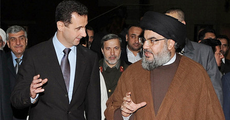 السيد حسن و بشار الاسد