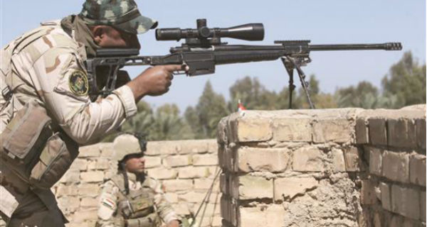 القوات العراقية حققت تقدماً في قضاء الكرمة غرب بغداد (أ ف ب)