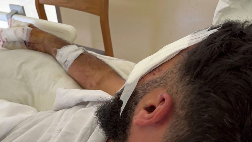 A man wounded by pager attack (Reuters)