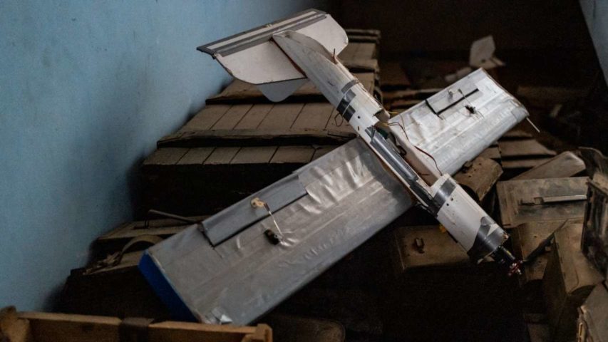 A discarded drone on top of boxes of munitions at a former Hezbollah training base (Washington Post)
