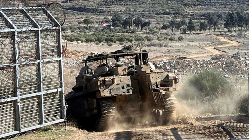 Israeli Armoured Personnel Carrier enters Syria in December 13 (Reuters)