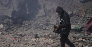 Israeli airstrikes hit several houses in Sir al-Gharbiyeh village south Lebanon (AP)